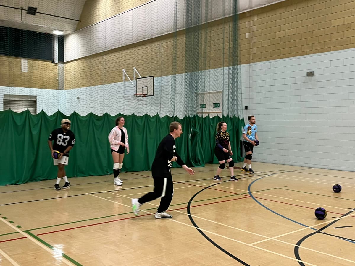 Players mid-game in the sports hall